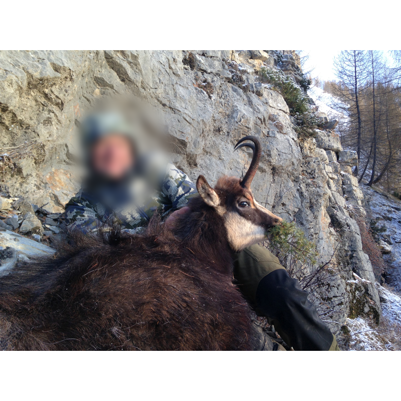 hunter with trophy of chamois in France