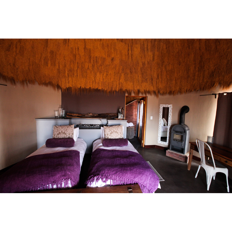 Chambre avec lits simples au lodge de chasse Namibie