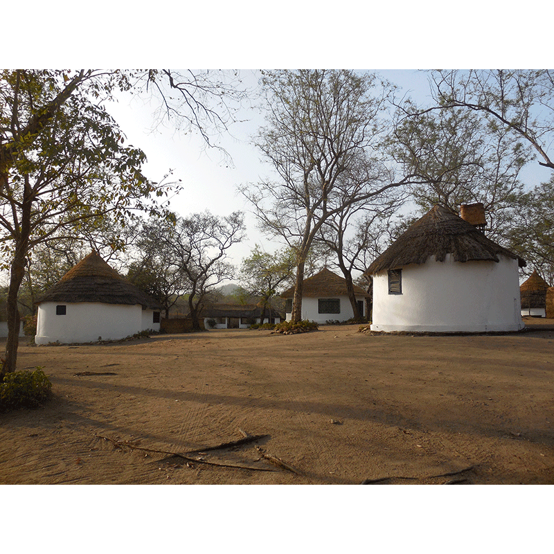Thatched-roof bungalows on Faro hunting camp in Cameroon